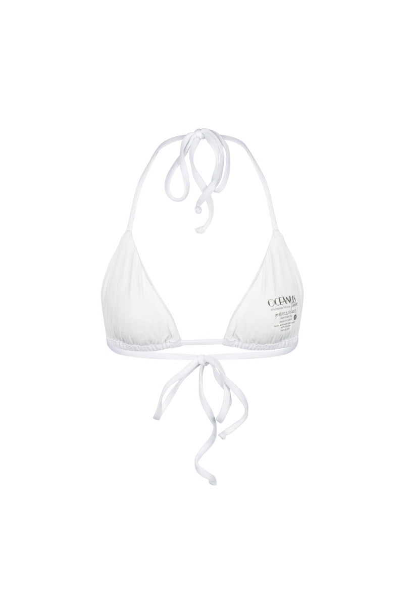 White Stella Oceanus bikini top with adjustable straps and a sleek, modern design, perfect for beach and poolside wear.