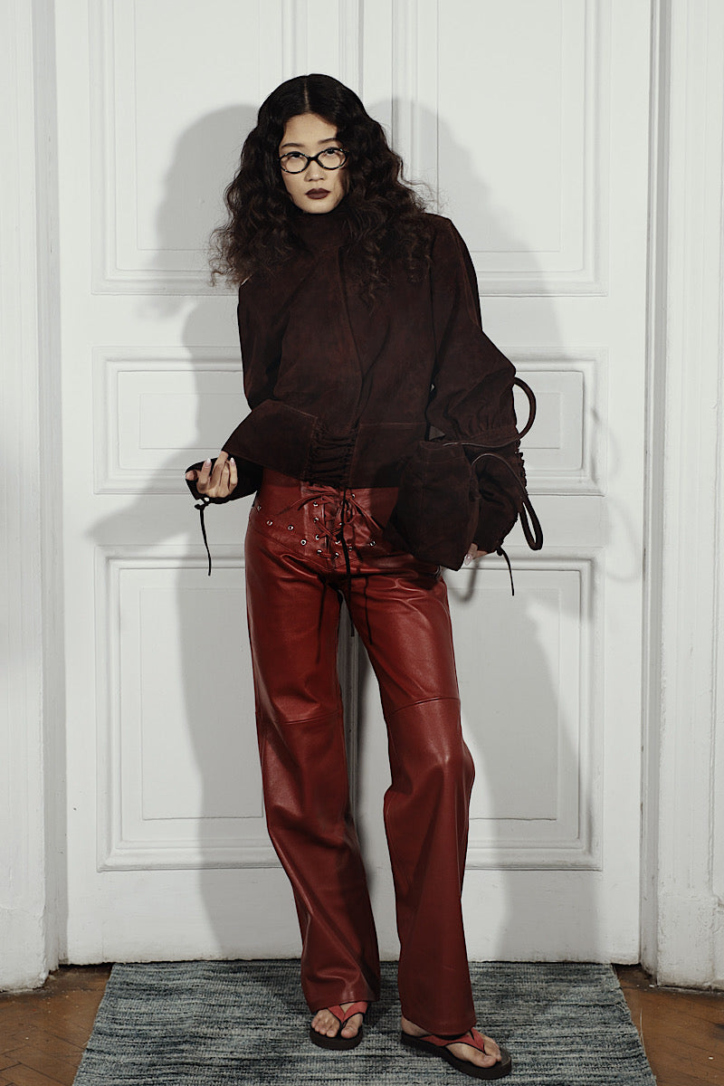 Double A jade suede brown jacket with a tailored fit, shown on a hanger with a smooth, soft texture and classic style.