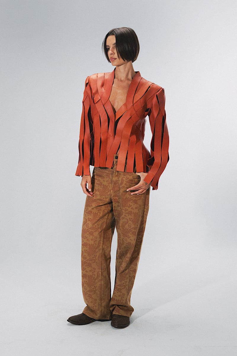 Orange leather jacket by Double A, Brianna style, featuring a fitted design with a collar and zipper front.