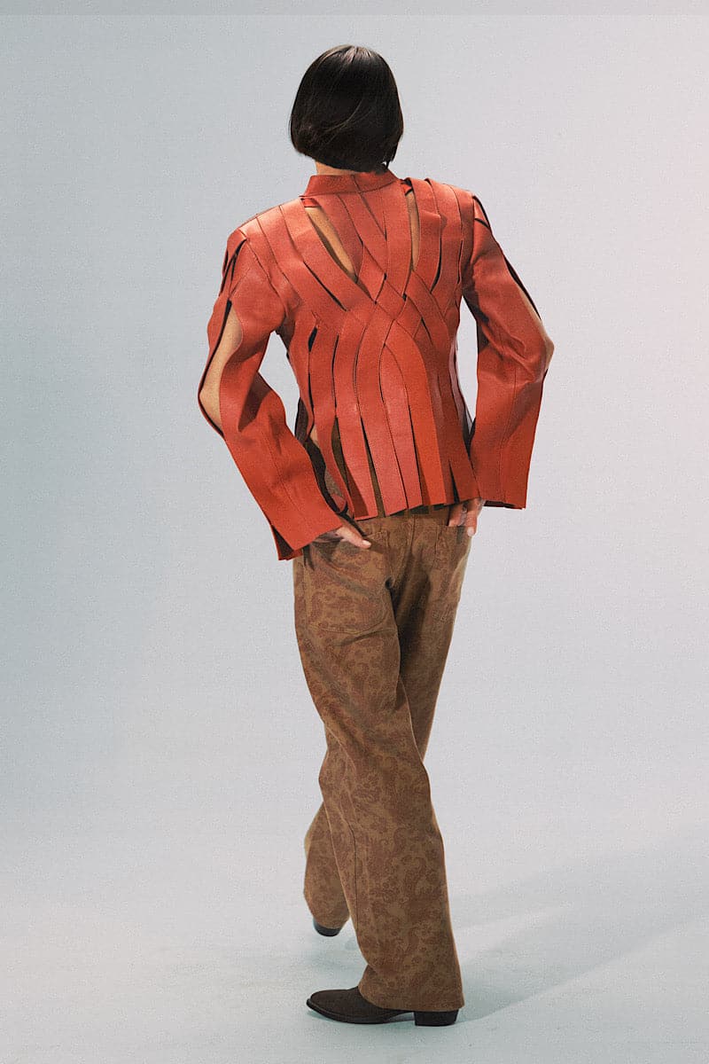Orange Brianna leather jacket by Double A, featuring a stylish design with visible stitching and a fitted waist.