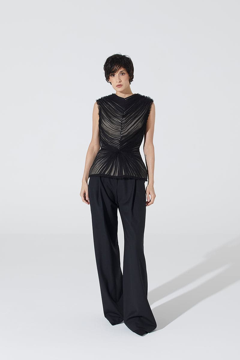 Black sheer corset top from BABUKHADIA, featuring lace-up details and fitted design, perfect for stylish tops.