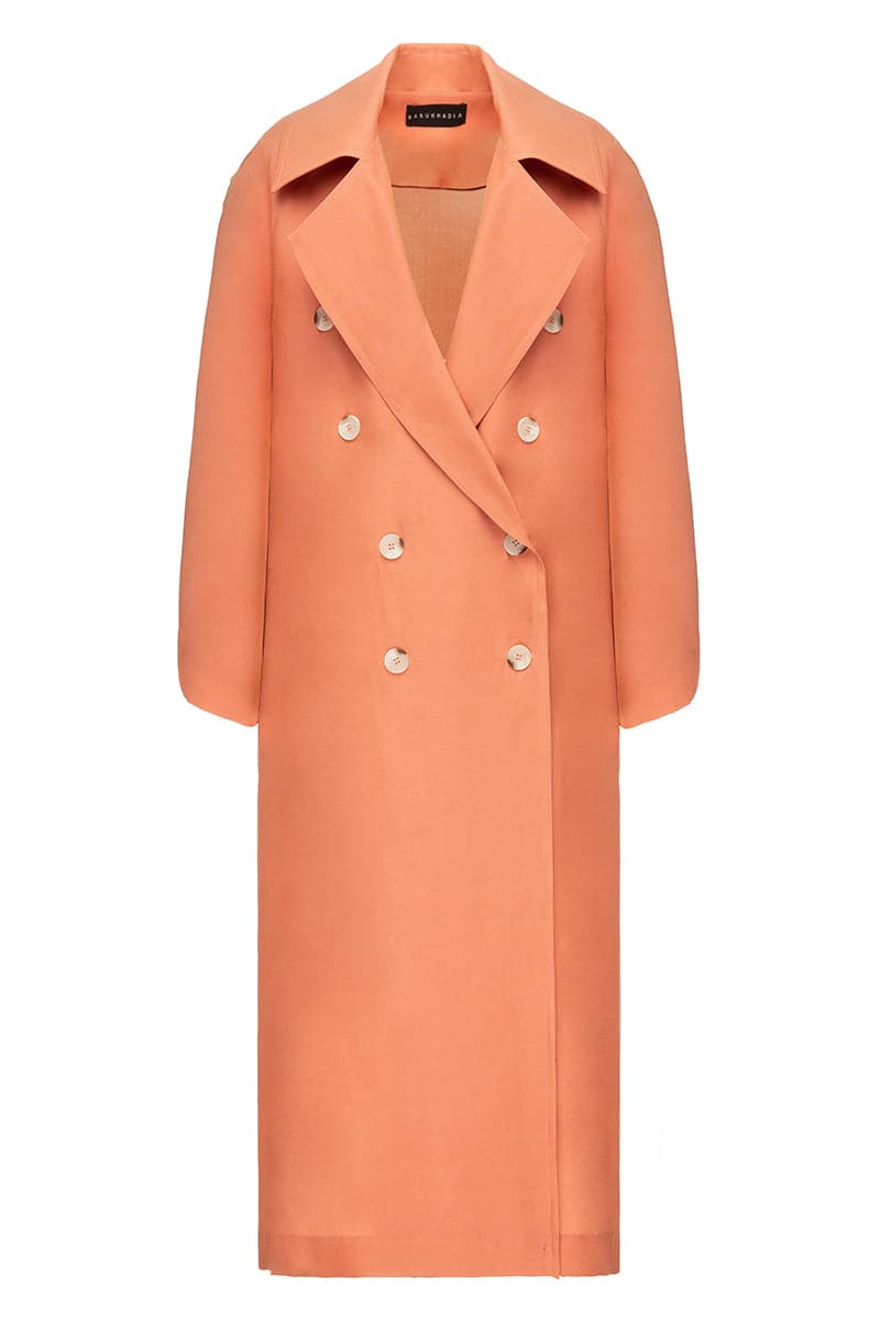 Orange wide lapel coat by Babukhadia, stylish outerwear with a tailored fit and classic design, shown on a model.