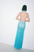 Nué Alessia blue gown displayed on a hanger, showcasing elegant fabric and classic design, perfect for formal occasions.