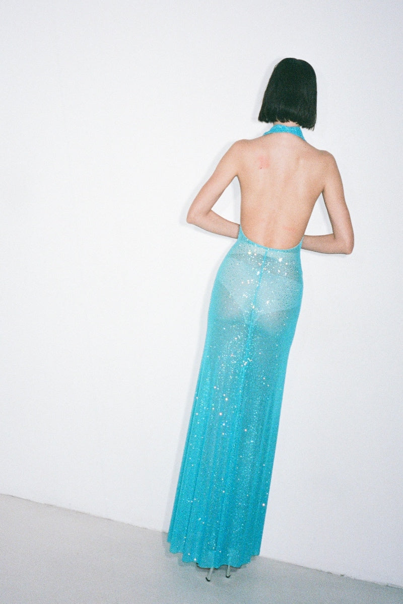 Nué Alessia blue gown displayed on a hanger, showcasing elegant fabric and classic design, perfect for formal occasions.