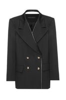 Black trimmed lapel blazer by BABUKHADIA, featuring tailored fit and classic design, shown on a model.