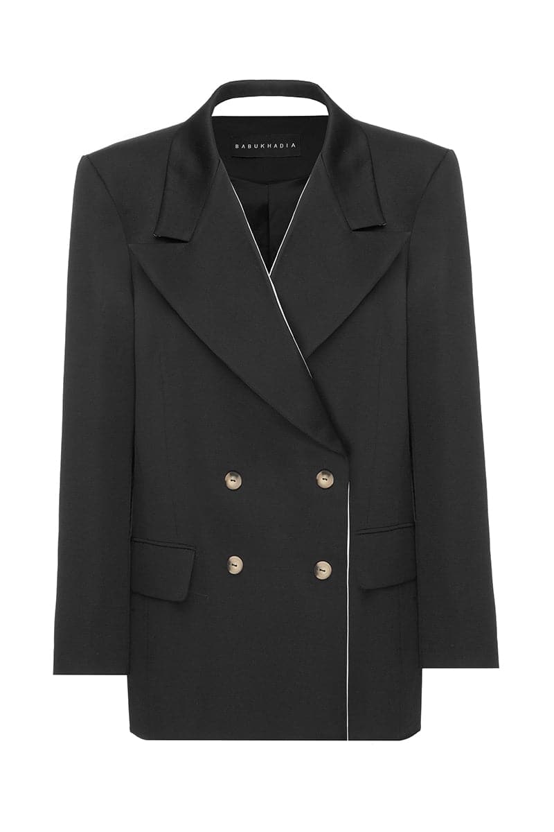 Black trimmed lapel blazer by BABUKHADIA, featuring tailored fit and classic design, shown on a model.