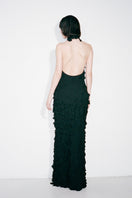 Elegant black Swan gown by Nué featuring flowing fabric and a sophisticated design, perfect for formal occasions.