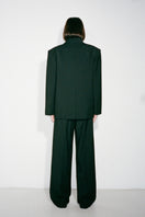 Black Martine blazer jacket by Nué, tailored fit with lapel collar and button closure, displayed on a mannequin.