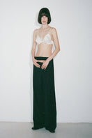 Nué Mimi Bullet Bra in white and black with soft cups and adjustable straps, stylish and comfortable undergarment for everyday wear.