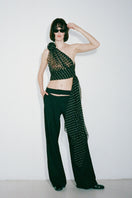 Black HELOÏSE top by Nué, featuring a fitted design with a stylish neckline, displayed on a neutral background.