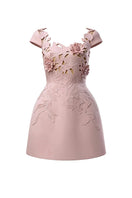 Pink 3D floral mini dress from ROSEE DE MATIN featuring a fitted bodice and flowy skirt, perfect for spring or summer wear.