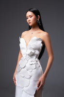 White CULT MIA X HAPPY CLOTHING pegged sleeveless taffeta maxi dress hanging on a rack.