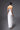 CULT MIA X HAPPY CLOTHING PEGGED SLEEVELESS TAFFETA MAXI DRESS IN WHITE - CULT MIA