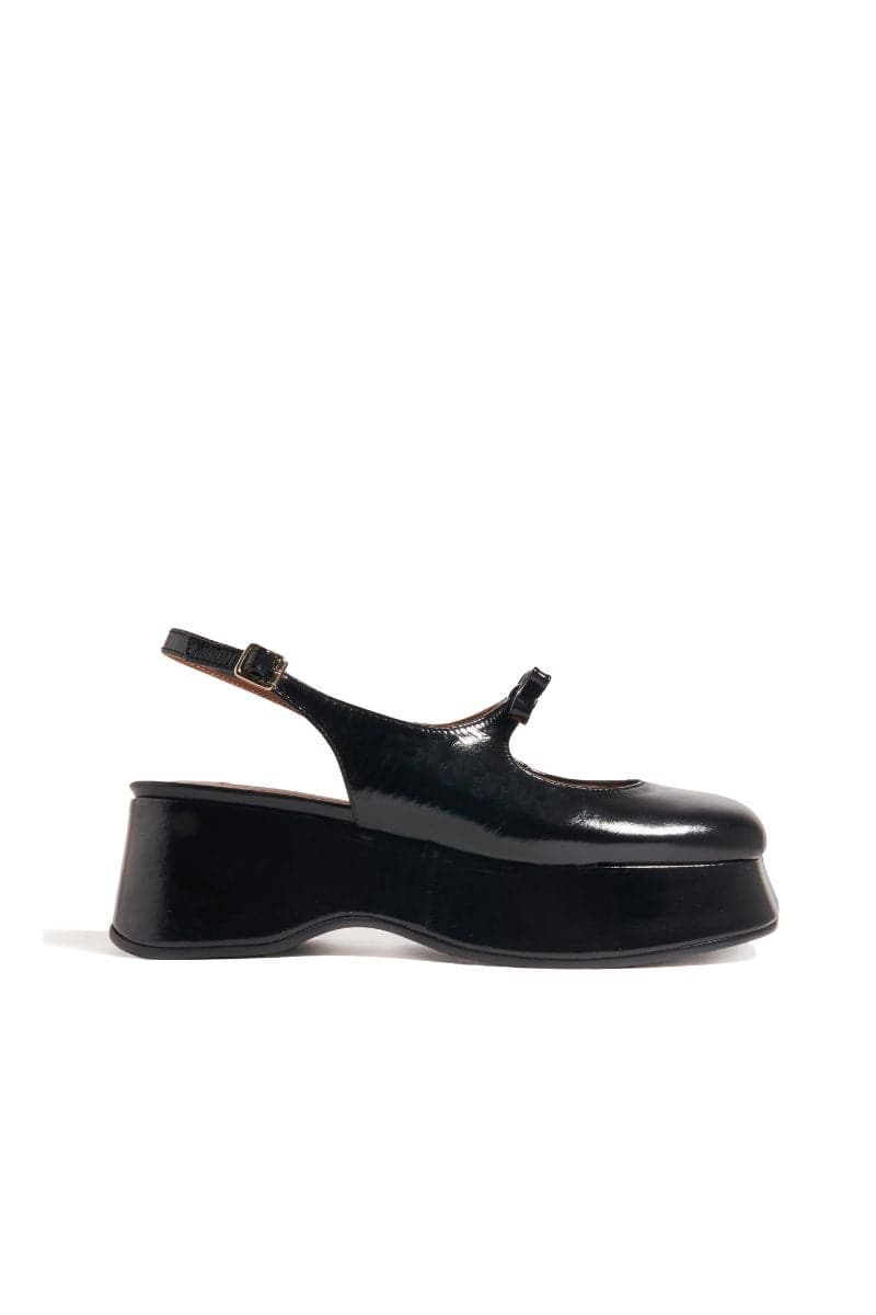 Black Avignon chunky platform heels by Je La Connais, featuring thick soles and stylish ankle straps, size EU 35.