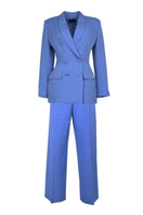 Baby blue hourglass suit co-ord set by Joanna Andraos, featuring a fitted top and matching pants in soft pastel blue.