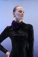 Full-length black sequins gown by Joanna Andraos, featuring a sleek, elegant design perfect for formal occasions.