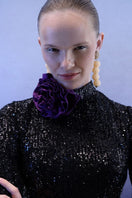 Full-length black sequins gown by Joanna Andraos, elegant midnight black maxi dress with shimmering sequins.