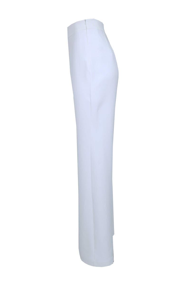 Off-white strapless bridal ensemble co-ord top and pants set by Joanna Andraos, featuring elegant, fitted design for special occasions.