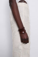Cream Jora Fringe Trousers by SÉLONE featuring flowy fabric and fringe detailing, styled as casual or boho chic pants.
