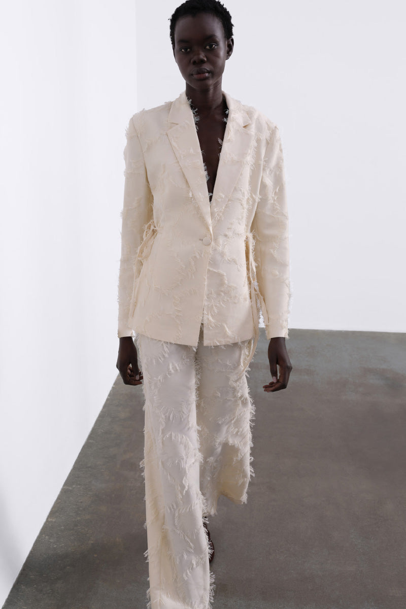 JORA FRINGE OPEN-BACK BLAZER IN CREAM