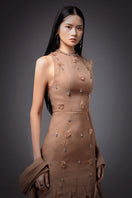 Brown CULT MIA X HAPPY CLOTHING mermaid organza gown featuring intricate details and flowing fabric, perfect for elegant occasions.