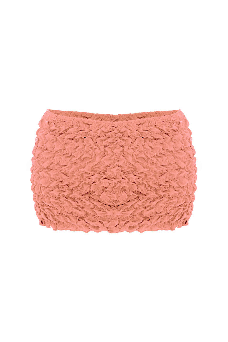 Selia Richwood LIA Peach Mini Beach Skirt cover-up with a lightweight, flowy design perfect for beachwear and warm weather outings.