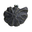 Emm Kuo Kahala woven circular clutch in black with sea shell design, featuring a textured woven pattern and elegant round shape.