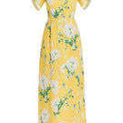 Yellow-green Katherine gown by Mestiza New York, flowing fabric and elegant design shown in the image.
