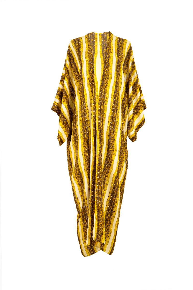 Gold Brocot kimono maxi dress by Amel Batita featuring elegant flowing fabric and intricate brocot pattern.