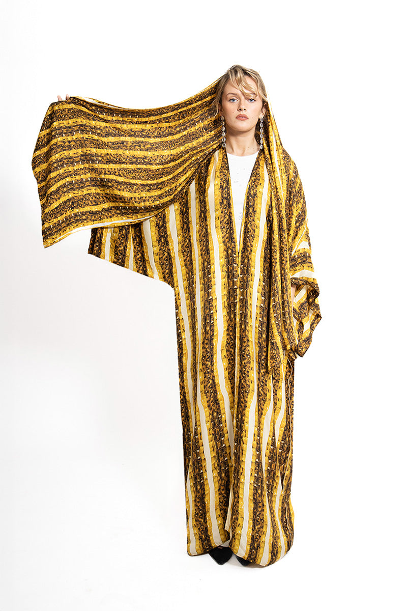Gold Brocot silk kimono by Amel Batita, maxi dress with elegant brocot pattern and flowing fabric, displayed as a stylish garment.