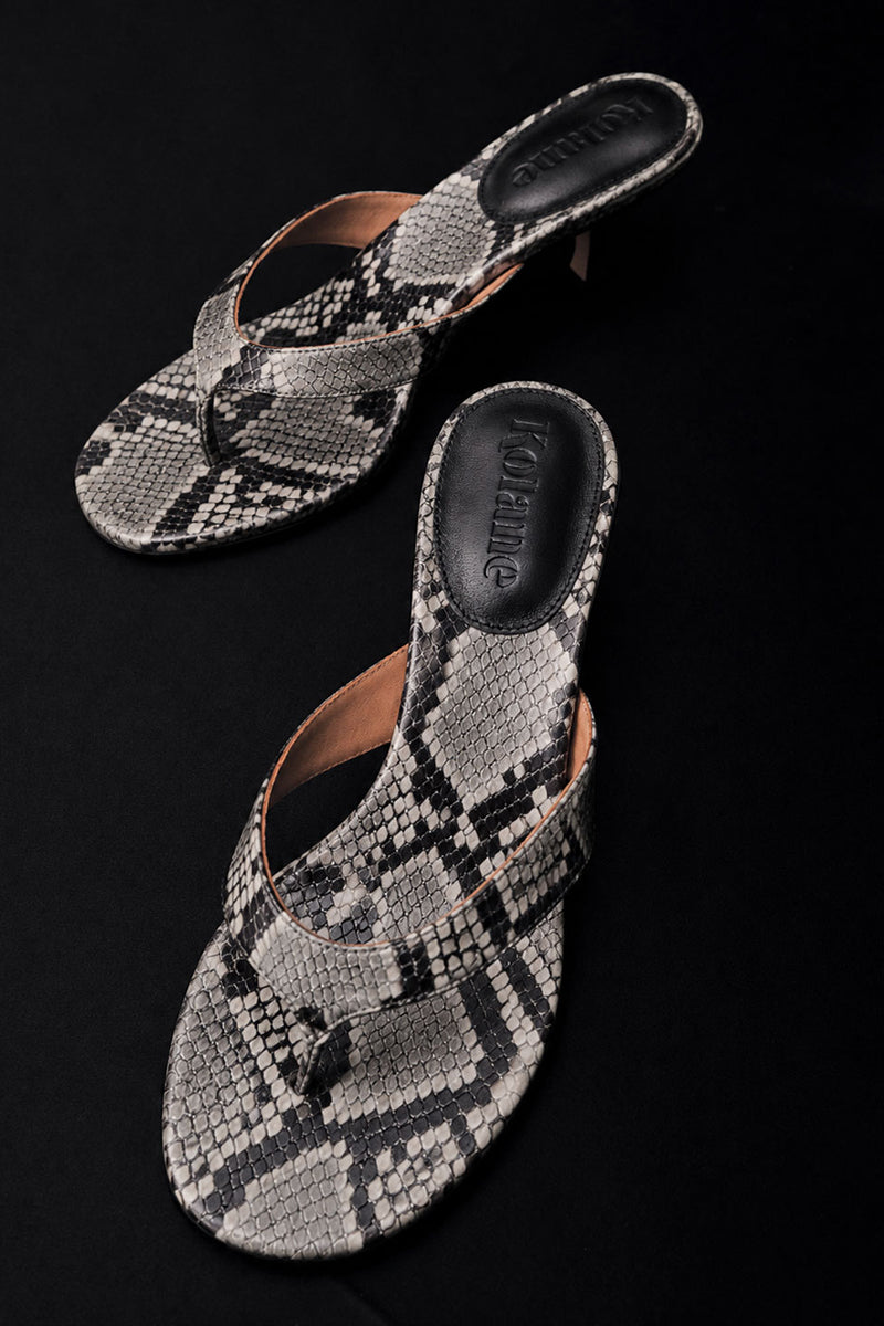 Grey python embossed Kolane Annie sandal 45 with stylish strappy design and textured finish.