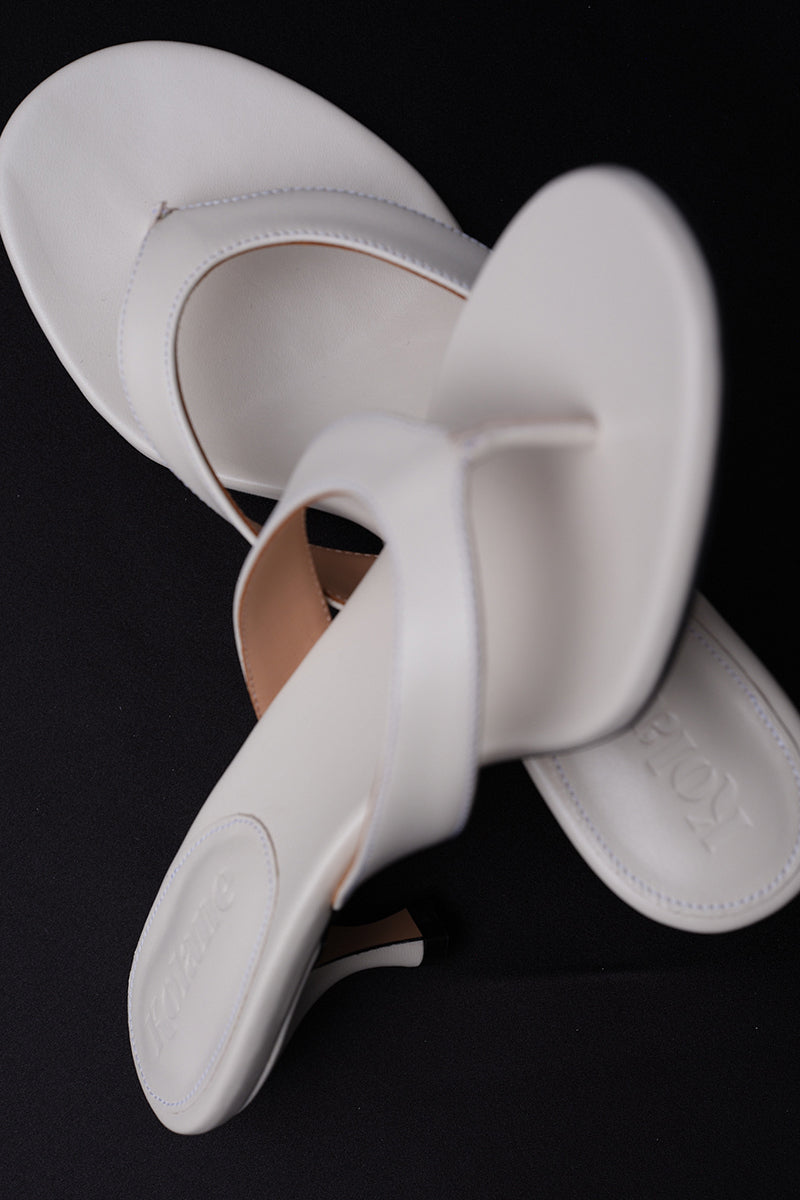 Ivory Kolane Annie Sandal size 45 featuring open-toe design and stylish straps, perfect for casual or dressy summer wear.