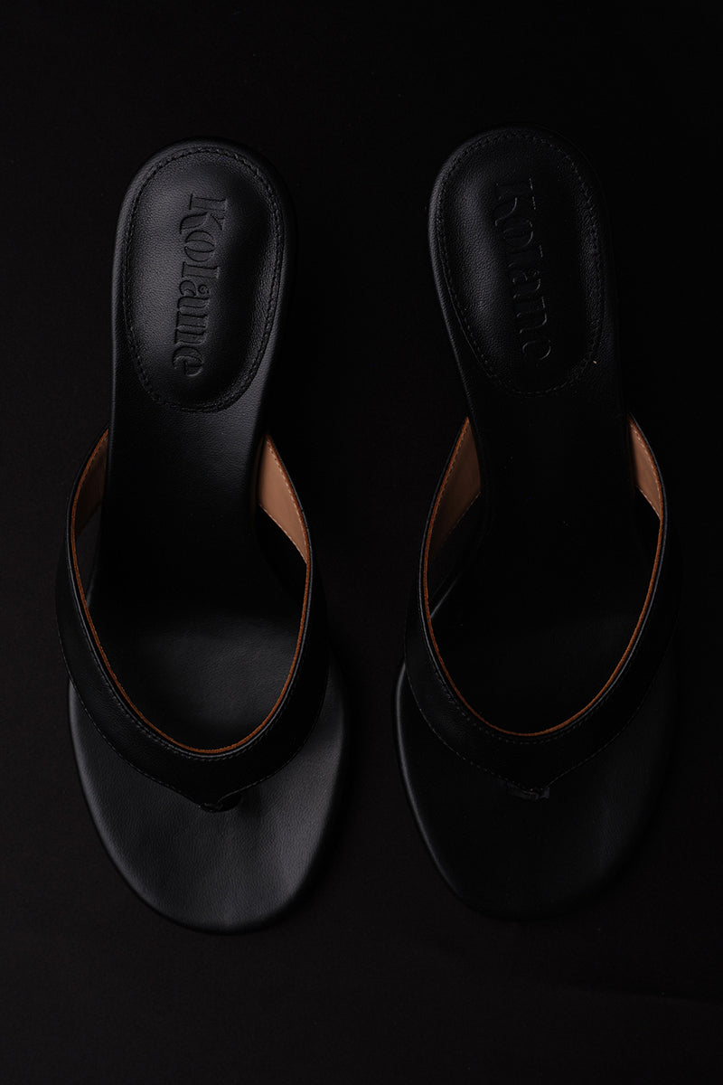 Black Kolane Annie Sandal size 45 with sleek straps and open toe design, perfect for casual summer wear.