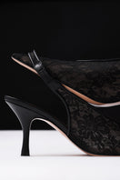 Black Kolane Dolly Sling 70 lace heels with elegant design, showcasing the stylish open-toe footwear in the product image.