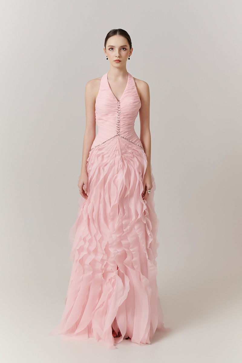 Elegant blush cascade halter gown by Happy Clothing featuring flowing fabric and a flattering halter neckline.