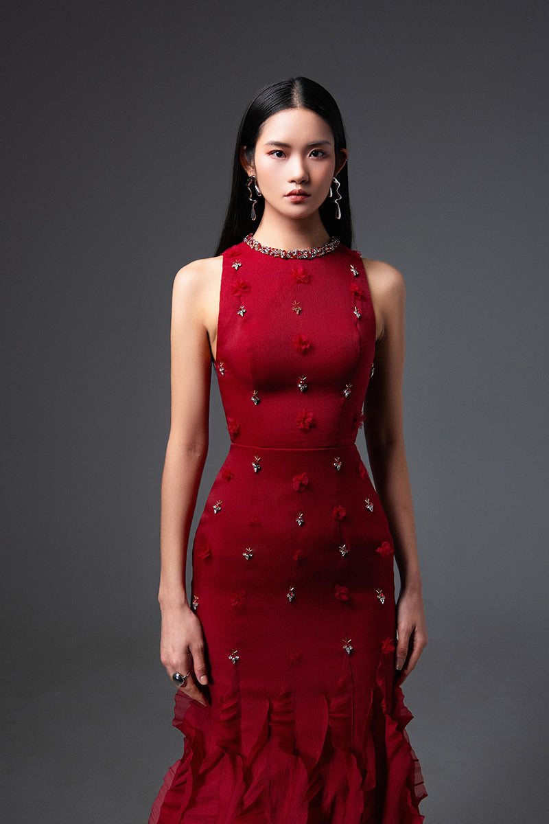 Red mermaid organza gown by Happy Clothing with intricate detailing, styled with flowing fabric and elegant design.