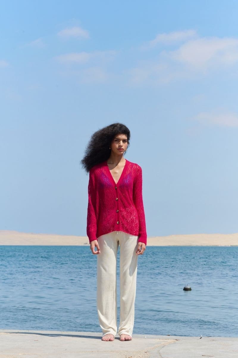 Pink raspberry-colored V-neck cardigan by La Granni featuring a delicate arañita knit design, XS size, soft and stylish.