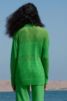 Green La Granni Aranita collared cardigan with long sleeves and button closure, styled on a mannequin.