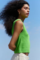Lime green La Granni cropped vest, a stylish cardigan with a fitted design, displayed on a neutral background.