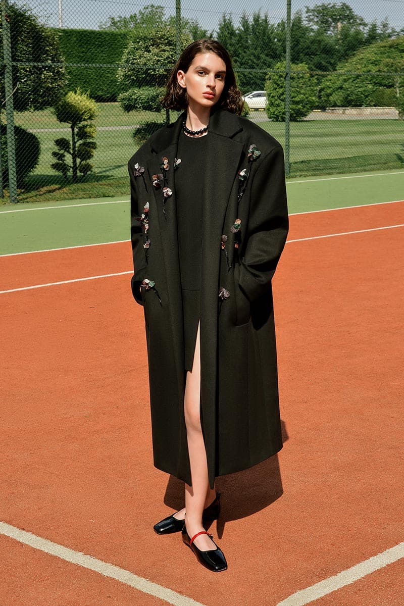 Lalo black Bouquet Coat for women, showcasing a stylish coat with a floral pattern in black, front view.