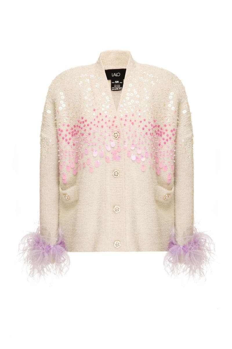 Lalo knitted cream co-ord set with feather cuffs, featuring a cozy knit top and matching bottoms in a soft cream and lilac color.
