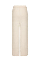 Lalo knitted cream co-ord set with feather cuffs, featuring a cozy knit texture and elegant feather details on the cuffs.
