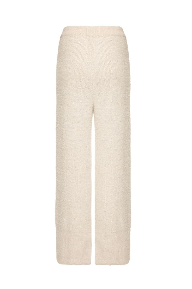 Lalo knitted cream co-ord set with feather cuffs, featuring a cozy knit texture and elegant feather details on the cuffs.