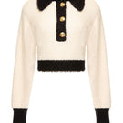 Lalo Old World button-up sweater in white and black, featuring a classic design, cozy knit fabric, and button details.