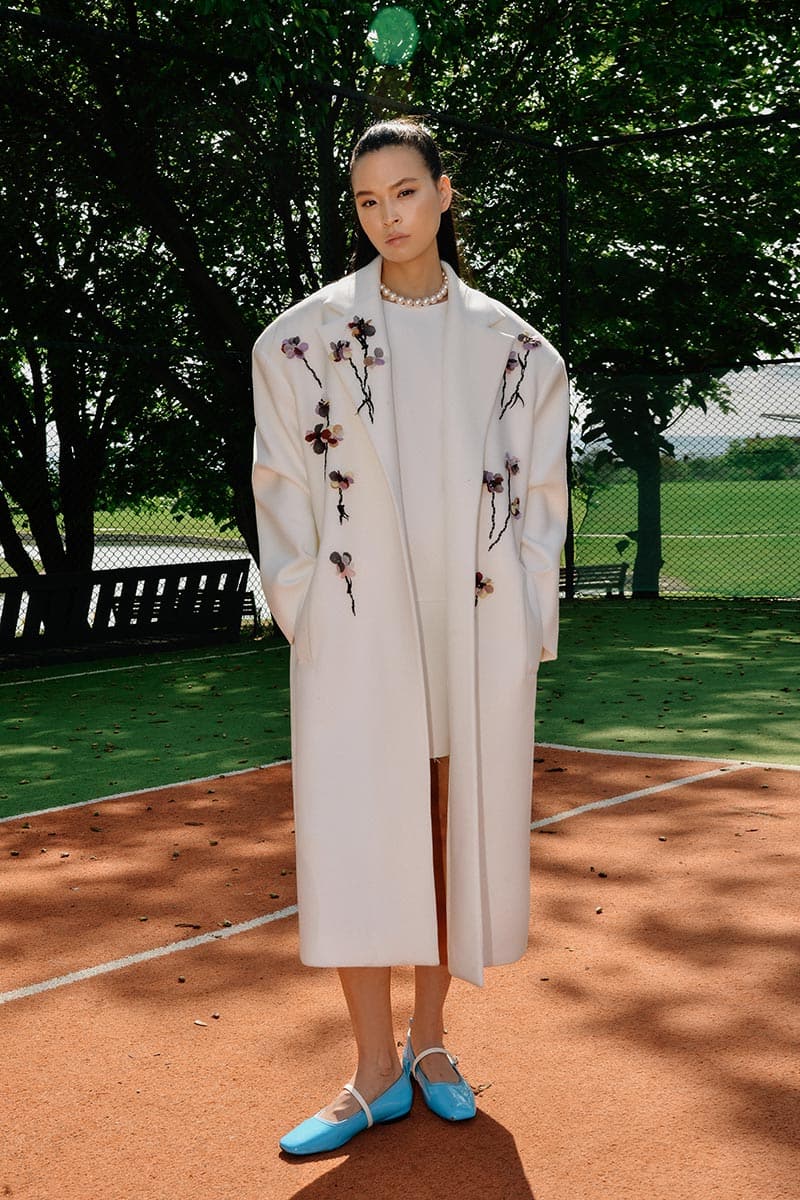 White Bouquet Coat by Lalo, lightweight and stylish coat with floral design, shown in size XS.