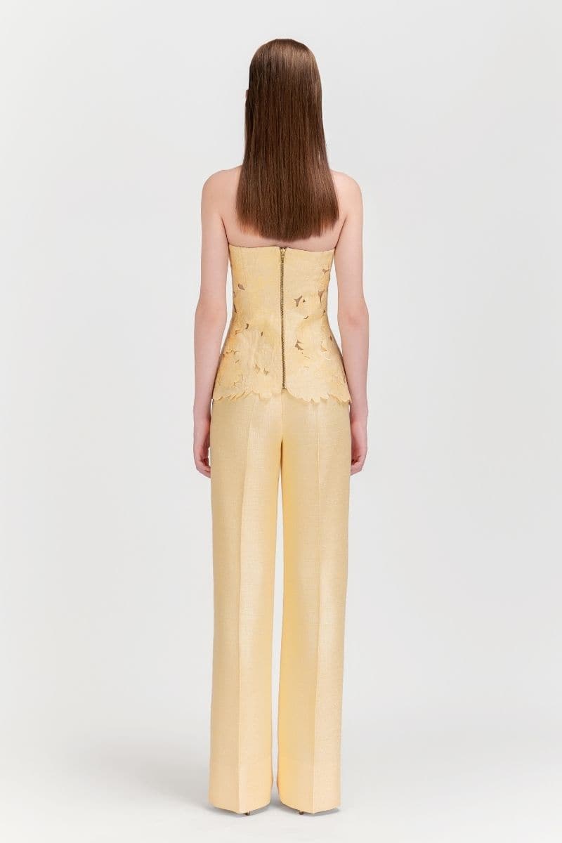 Pastel yellow strapless puffed top and matching co-ord pants set by Le Thanh Hoa, featuring a stylish, coordinated look.