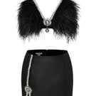 Black EVA crop top and mini skirt co-ord set by Le Thanh Hoa, stylish and fitted for a modern look.