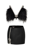 Black EVA crop top and mini skirt co-ord set by Le Thanh Hoa, stylish and fitted for a modern look.