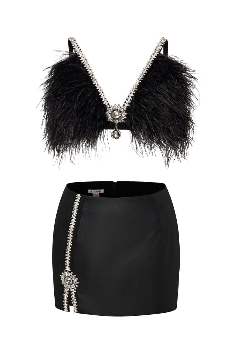 Black EVA crop top and mini skirt co-ord set by Le Thanh Hoa, stylish and fitted for a modern look.