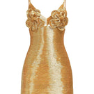 Le Thanh Hoa golden floral mini dress in gold, showcasing a stylish short dress with vibrant floral pattern and fitted design.
